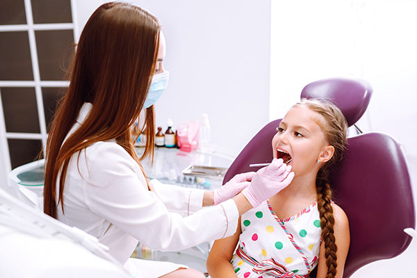 When to See a Kid Friendly Dentist from Paramount Dental Care & Specialty in Long Beach, CA